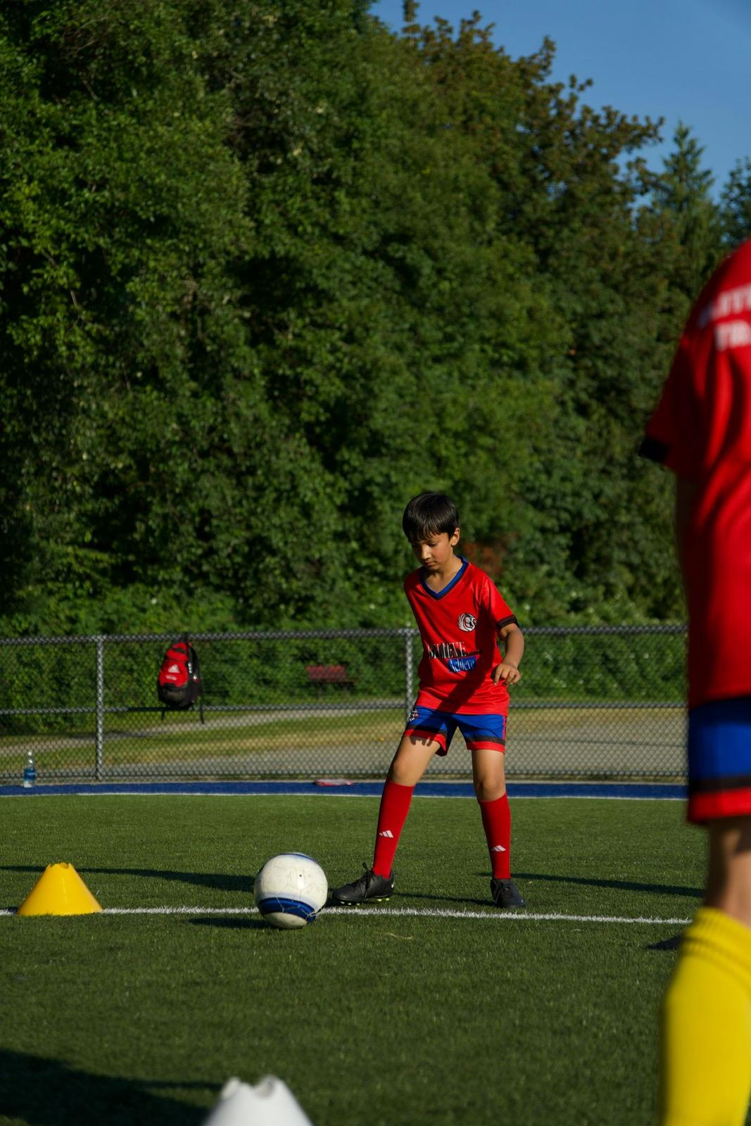 Young soccer players in a group training session